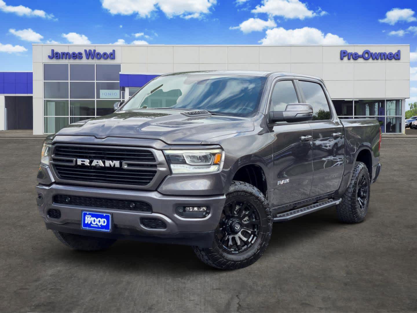 2023 RAM 1500 Laramie Crew Cab 4x4 5'7" Box in Gray — front three-quarter view