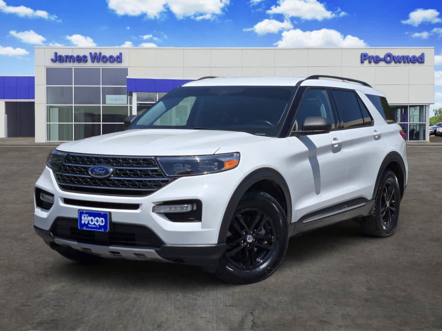 2023 Ford Explorer XLT in White — front three-quarter view