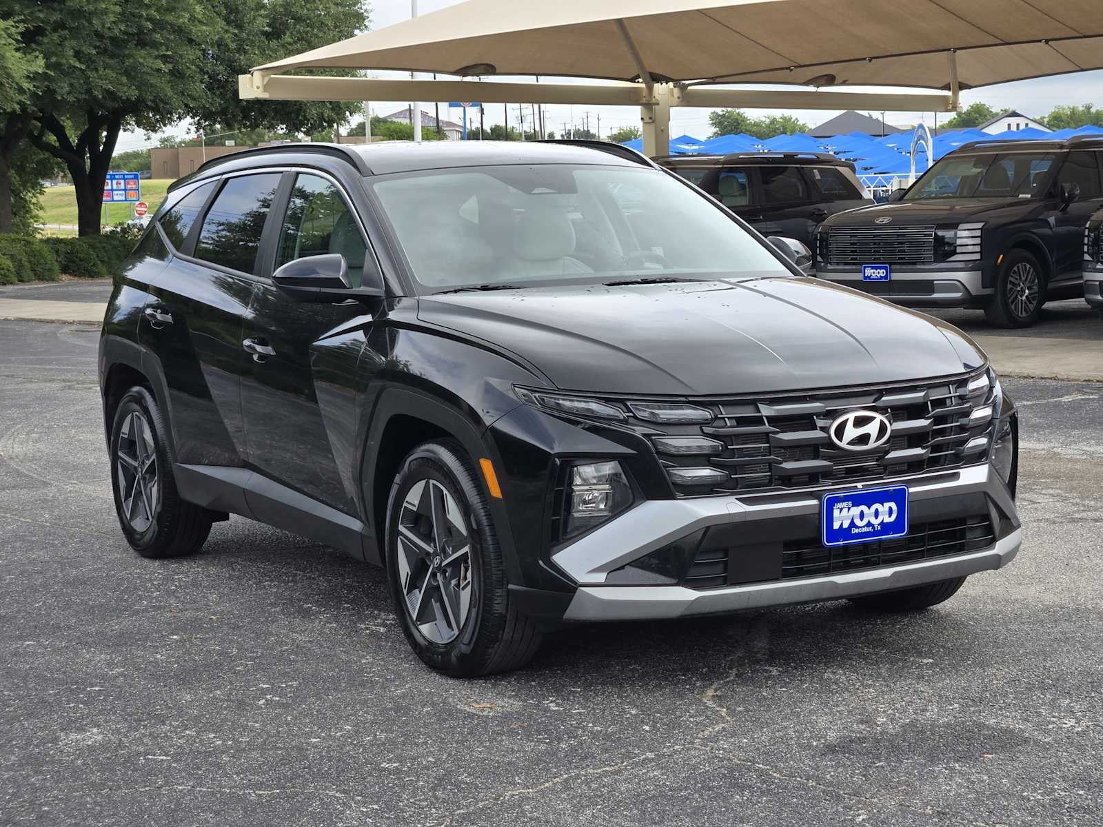 2025 Hyundai Tucson — rear three-quarter view