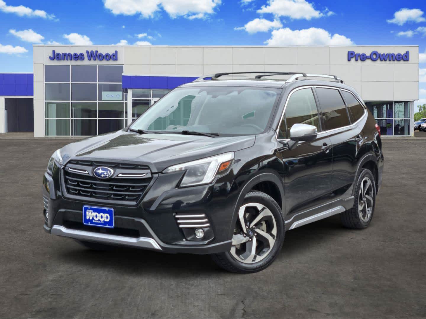 2022 Subaru Forester Touring in Black — front three-quarter view